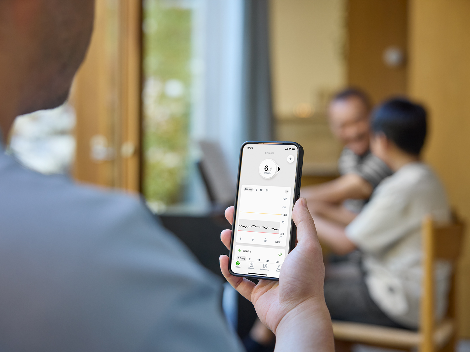 Man checking glucose on the phone